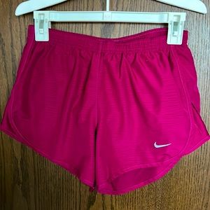 Magenta Nike athletic running shorts